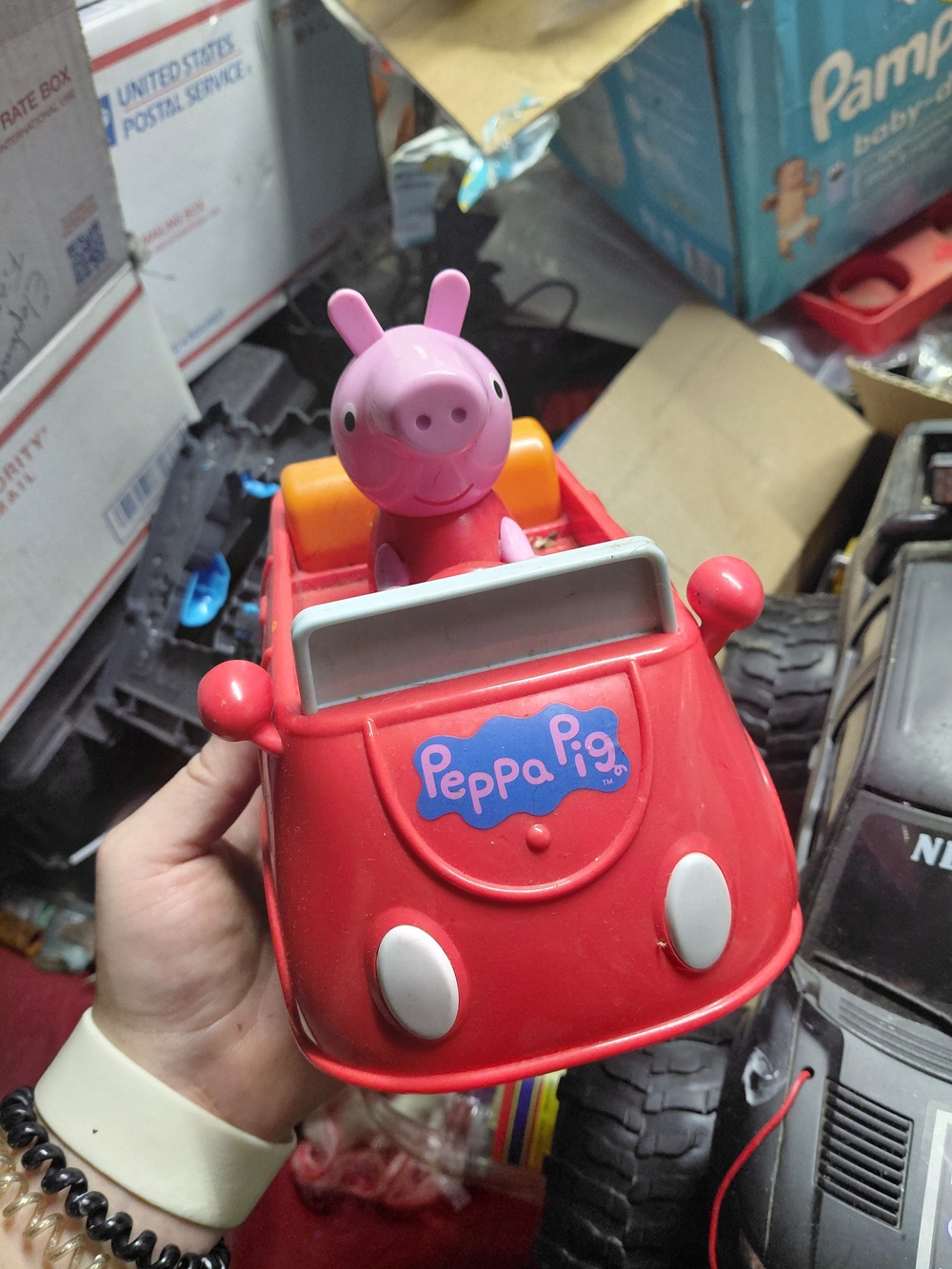 Peppa Pig Little Red Car toy features rolling wheels and includes a 3-inch Peppa
